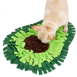 French bulldog sniffing out treats in a Coathaus Snuffle Mat