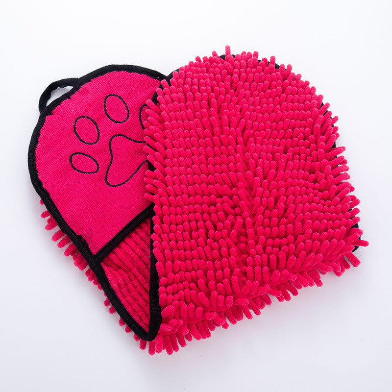 The Coathaus Microfiber Pet Drying Towel in dusty rose, folded to show both textures and the hand pocket